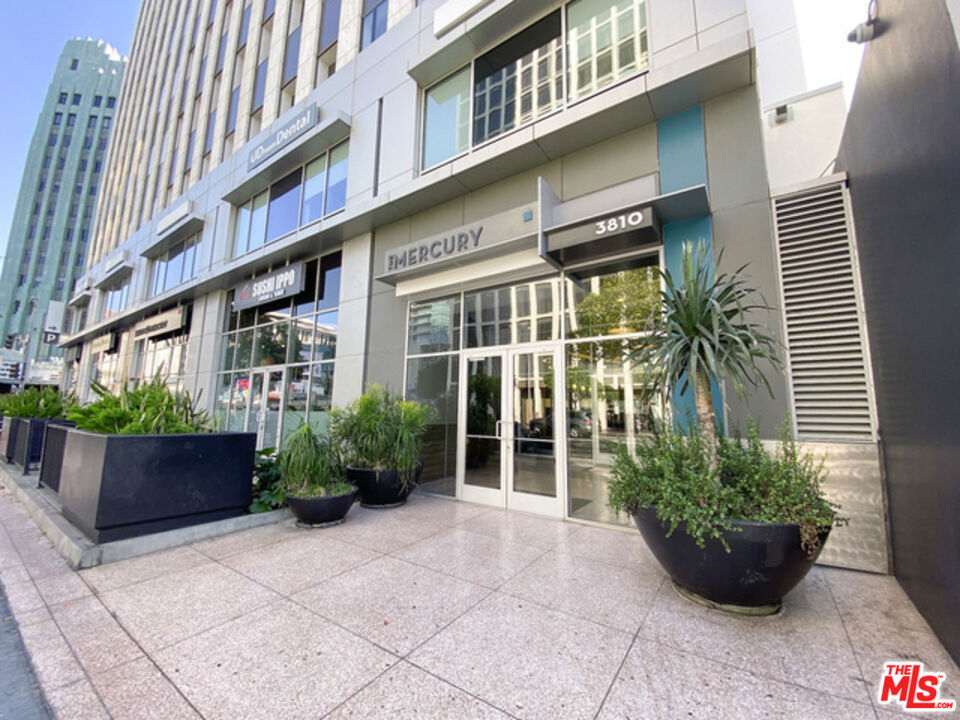Luxury high-rise condo located at the prime corner of Wilshire & Western. This bright south-facing one-bedroom unit features bamboo flooring, granite countertops, stainless steel appliances, high ceilings, and in-unit washer & dryer. Spacious living area with panoramic city views creates an open and modern atmosphere. Residents enjoy resort-style rooftop amenities, including pool, spa, BBQ area, garden, gym with 360 views, along with 24-hour security. Conveniently situated within walking distance to restaurants, shopping, and Metro Line, this home offers the perfect blend of comfort, style, and urban lifestyle.