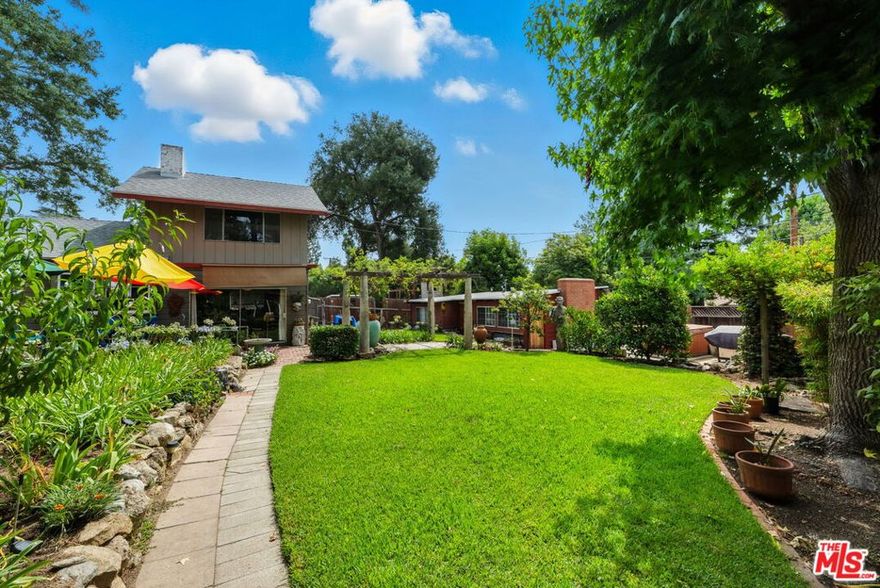 On the market for the first time in nearly nine decades, this rare Altadena property combines architectural pedigree with exceptional potential. Designed by acclaimed architect Calvin Straub, the front residence serves as the centerpiece of a three-structure compound totaling approximately 3,000 square feet. Each building is thoughtfully arranged around a central garden and yard, enhanced by a tranquil pond. From the upper level of the rear residence, enjoy peekaboo views of Downtown Los Angeles on clear days. This distinctive property is not only rich in history and character but also an exceptional investment opportunity. Buyers can choose to restore and enhance the existing compound or reimagine the site with one or two larger residences. Located just moments from Downtown Pasadena, the Jet Propulsion Laboratory, and the Rose Bowl, the property offers a rare blend of heritage, location, and development versatility in a highly desirable area. A rare opportunity to own this property, where history, character, and potential come together in a truly distinguished offering.