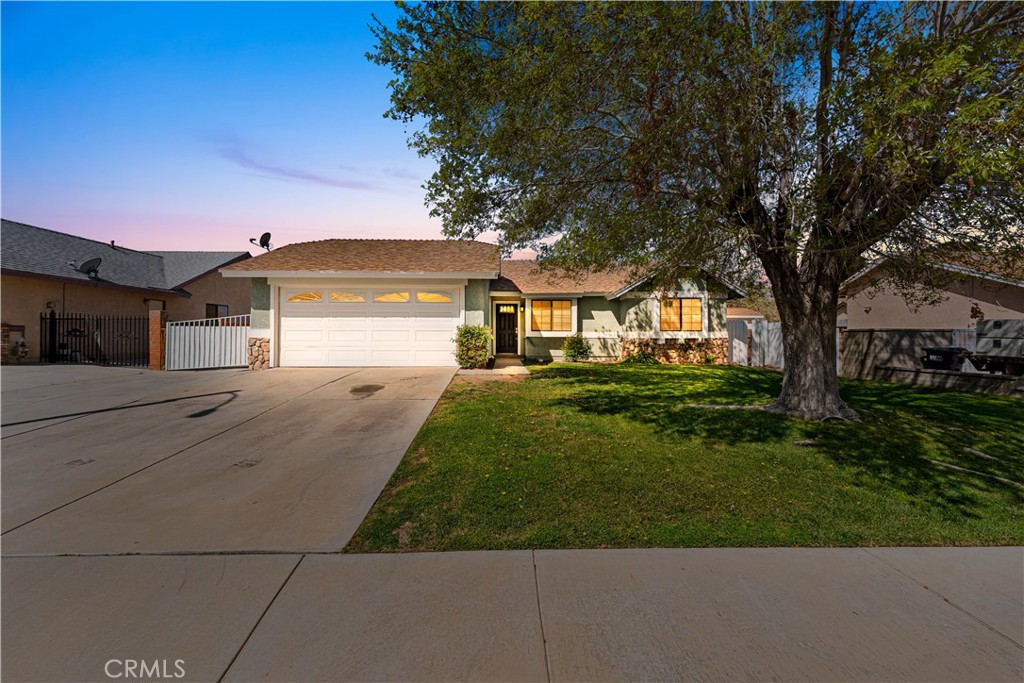 Charming Single-Story Gem in Palmdale
Welcome to this beautifully maintained single-story residence in a desirable Palmdale community. This lovely 1,045 square foot home features New roof, three comfortable bedrooms and two well-appointed bathrooms, creating the perfect balance of space and comfort.
Recently refreshed with new paint, this residence radiates pride of ownership at every turn. The thoughtfully designed kitchen showcases elegant granite countertops with refined square edges complemented by crisp white cabinetry. Each room offers generous proportions, ensuring comfort for everyone in the household.
One of this property's standout features is its expansive lot with dedicated recreational vehicle access. The cemented side area provides exceptional versatility—ideal for maintenance-free outdoor entertaining or additional vehicle storage. The backyard presents numerous possibilities for outdoor enjoyment, gardening enthusiasts, or simply relaxing under the California sun.
Nature lovers will appreciate the proximity to William J. McAdam Park, just a short distance away, offering green spaces and recreational opportunities for all ages.
Perfectly positioned near shopping conveniences while maintaining a peaceful neighborhood atmosphere, this residence represents an excellent opportunity for first-time homeowners or those looking to simplify their lifestyle without sacrificing quality.
With its single-level layout, spacious rooms, and thoughtful features, this home strikes the perfect balance between functionality and comfort—a place where memories are waiting to be made. Don't miss your opportunity to make this delightful Palmdale property your own!
