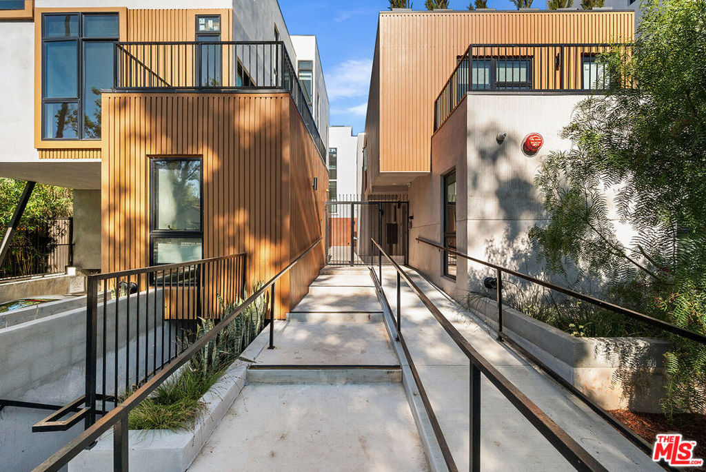 Enjoy a great lifestyle in this brand newly built stunning multi-level 3Bed. + Den/Office Townhome with its own cozy & private roof-top-deck located in highly desirable West Hollywood location. This spacious and sleek Residence offers a modern living-dining room featuring open designer kitchen with custom built cabinetry, quartz counter-top stones, top-of-the line appliances and terrazzo floors. The sumptuous primary bedroom Suite has generous closet space and luxury bathrooms with superb finishes. In addition to other two bedrooms, there is a multi-purpose bonus room ideal for office/ den, a powder room, an amazing private roof-top-deck and large balcony complimenting this superb property along with a recreational room/ gym, a subterranean gated parking area & separate storage space for each Residence. Exceptional and exclusive property perfect for indoor-outdoor California living! Prime location within close proximity to all stylish shops, restaurants and galleries.