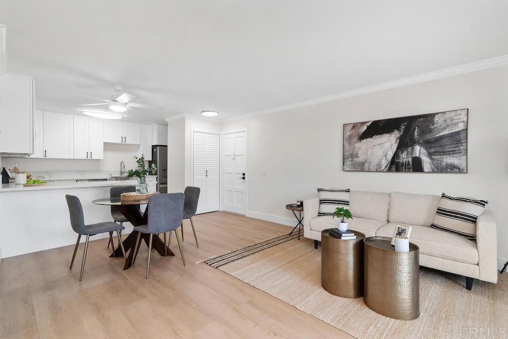 Completely updated in 2025, this thoughtfully laid out condo offers stylish living with wide-plank light wood LVP flooring throughout, complemented by crisp white walls, designer lighting, and fresh window treatments. The brand-new kitchen features white cabinetry with black hardware, quartz countertops and sleek stainless-steel appliances paired with a deep white apron-front sink. The bathroom has been completely refreshed with coordinating cabinetry and contemporary finishes, including a tub/shower with classic white subway tile up to the ceiling. The spacious primary bedroom offers serene, park-like views and ample space for a sitting area or desk, and a full wall to wall closet and the light-filled secondary bedroom features a spacious walk-in closet. New double-pane windows and mirrored closet doors enhance both comfort and functionality. The patio, accessible through sliding glass doors off the living area, offers a perfect spot to enjoy morning coffee or unwind at the end of the day. Tucked into one of the most desirable pockets of Carlsbad and just minutes to downtown Carlsbad, beaches, Westfield Mall, daily conveniences with quick freeway access and more! Additional highlights include in-unit laundry, two assigned and covered parking spaces and an extra-large private storage closet for added convenience. Residents also enjoy access to community amenities such as a pool, spa, and tennis courts. Zoned for top-rated schools- including Buena Vista Elementary, Valley Middle, and Carlsbad High- this move-in ready condo is a perfect blend of comfort, style, and an unbeatable coastal location. Buyer and buyer’s agent to verify all in MLS prior to COE.