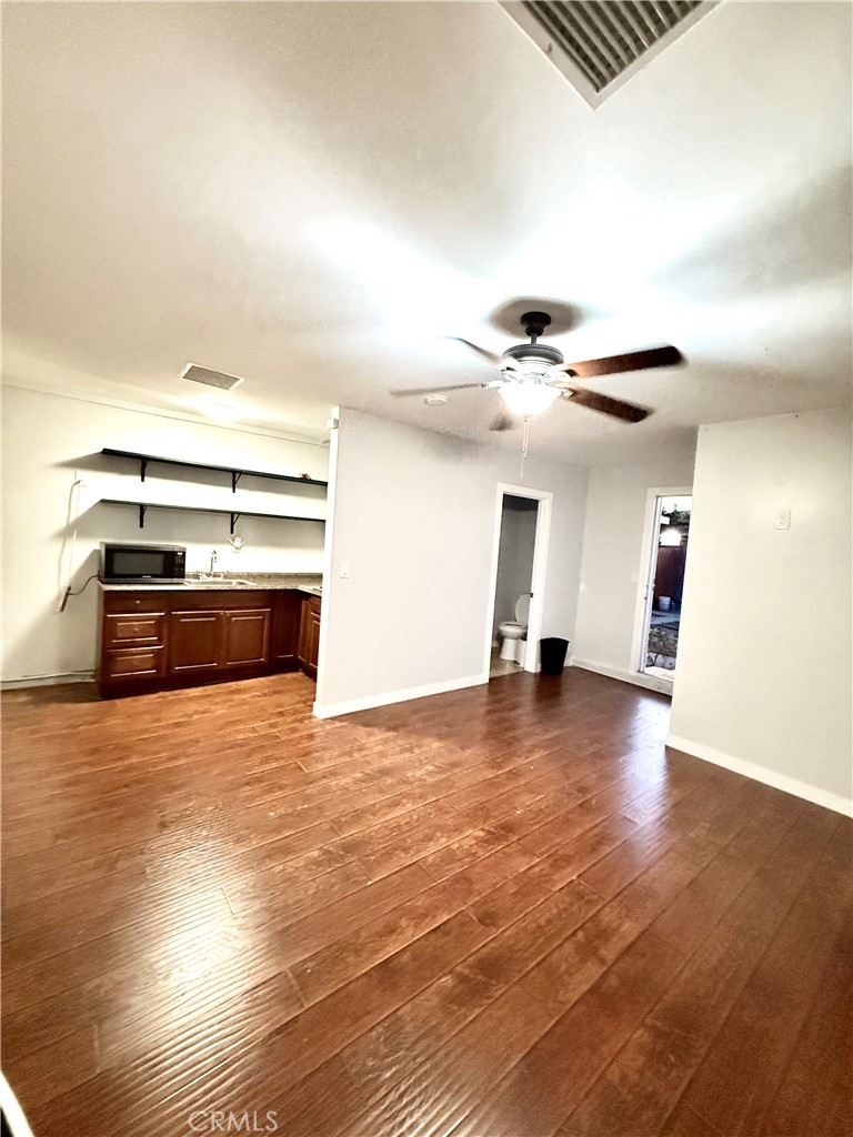 Welcome to this delightful one-bedroom, one-bath ADU located in the vibrant neighborhood of North Hollywood, California. This cozy home boasts an efficient layout, featuring a spacious living area that invites natural light, creating a warm and welcoming atmosphere. The well-appointed kitchen is perfect for cooking and entertaining, equipped with appliances and ample storage.