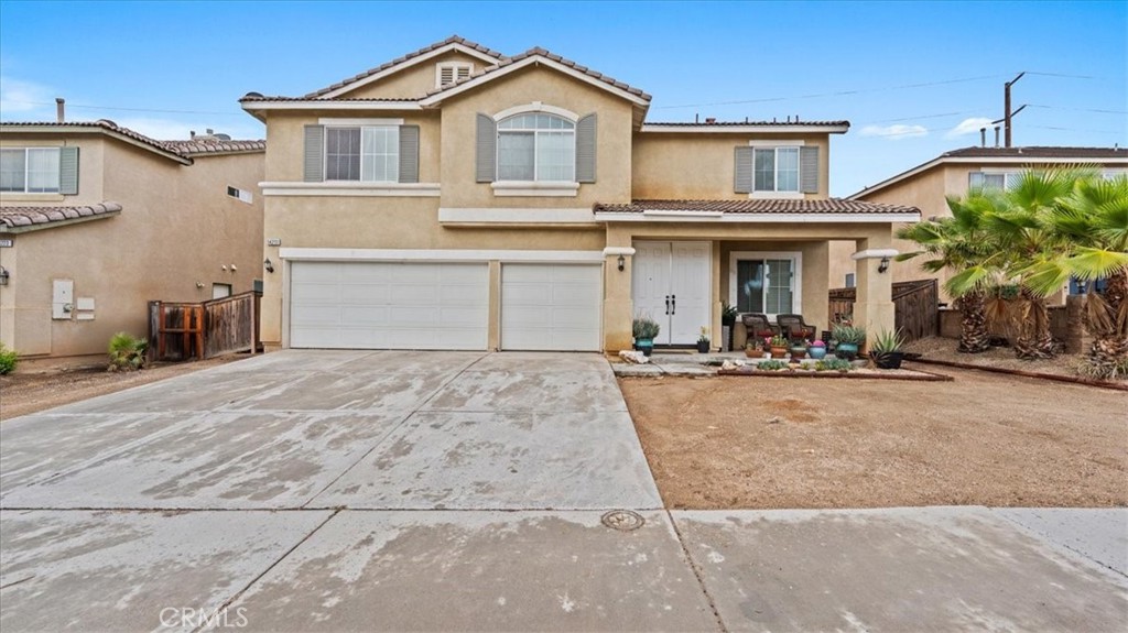 Welcome to this beautifully well maintained 5-bedroom, 2.75 bathrooms home offering nearly 3,000 square feet of living space in one of Hesperia’s most desirable neighborhoods. Nestled on a 8,556 sq ft lot, this home delivers comfort, space, and versatility—perfect for growing families or those needing extra room to live and work. Step inside to an inviting open floor plan featuring a spacious living and dining area filled with natural light. The kitchen is well-appointed with ample cabinetry and counter space, ideal for entertaining or preparing family meals. The layout includes five generously sized bedrooms, including a large primary suite with an ensuite bath and walk-in closet. The expansive backyard offers endless possibilities—create your dream outdoor oasis, set up a garden, or add a pool. The home also features a 3-car garage and plenty of driveway space for additional parking or RV access.