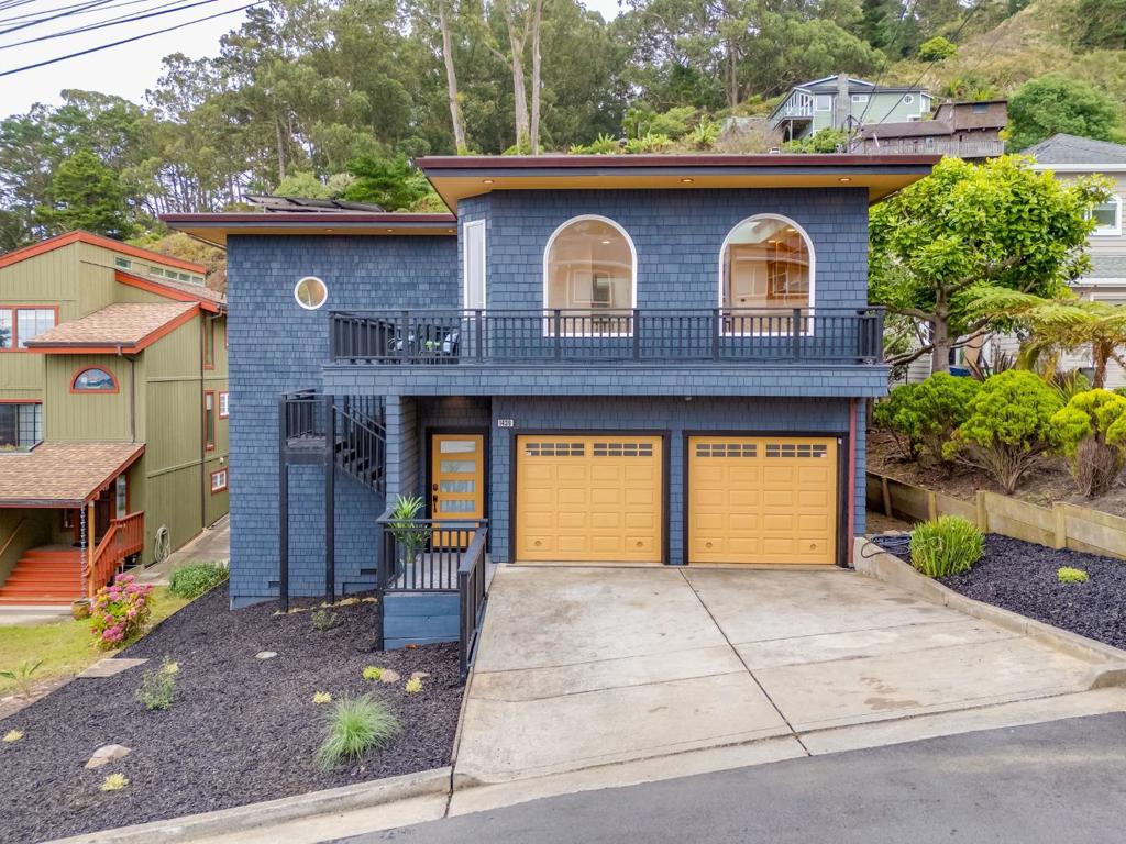 Enjoy breathtaking ocean views from almost every room and expansive backyard in this beautifully updated Pedro Point home. The gourmet kitchen, fully remodeled with permits, features a Sub-Zero refrigeration and a Wolf range, designed to impress both chefs and entertainers alike. A spacious covered deck, added in 2021, offers skylights, recessed lighting, and a double-sided fireplace for year-round indoor-outdoor living. The large, mostly flat backyard includes a children's play structure and a detached bonus room, also capturing stunning ocean vistas. Additional updates include a new roof in 2018, a Tesla Powerwall, and fully paid for solar panels, all providing peace of mind for years to come. Ideally located just minutes from Linda Mar Beach and local shopping, this 2,430 sq. ft. home sits on a generous 7,500 sq. ft. lot an exceptional coastal retreat.