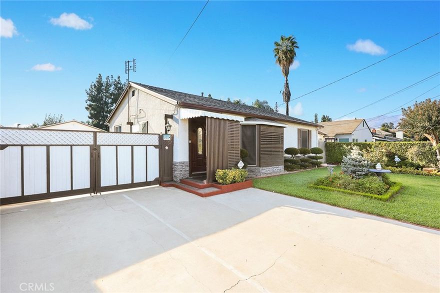 Tucked away on a peaceful street in the city of Arcadia, this charming single-story home offers the perfect blend of classic character and spacious living. With 3 generous bedrooms and 2 full bathrooms, it provides a warm, inviting atmosphere ideal for both relaxation and entertaining. Step inside to find thoughtfully sized bedrooms, including a spacious primary suite featuring an oversized walk-in closet — a rare and highly sought-after feature that adds convenience and storage. The home’s inviting layout begins with a bright, open living room that flows seamlessly into the kitchen. Toward the rear, a large family room creates the perfect casual gathering space for movie nights, playtime, or simply unwinding at the end of the day. For the savvy homeowner or investor, this flexible floor plan offers excellent “house hacking” potential. With a simple addition of a wall, the property could be converted into two self-contained units — a 2-bed/1-bath front unit and a 1-bed/1-bath rear suite — ideal for generating rental income or accommodating extended family. Curb appeal abounds, framed by elegant iron fencing and mature privacy hedges that create a sense of seclusion and retreat from the moment you arrive. Out back, the property truly shines. The expansive outdoor area is designed for the Southern California lifestyle — complete with a built-in outdoor kitchen, shaded patio cover, and plenty of space for al fresco dining and entertaining guests year-round. Whether you’re looking for a family home, a smart investment, or a private escape in the heart of Arcadia, this residence delivers comfort, versatility, and endless possibilities.