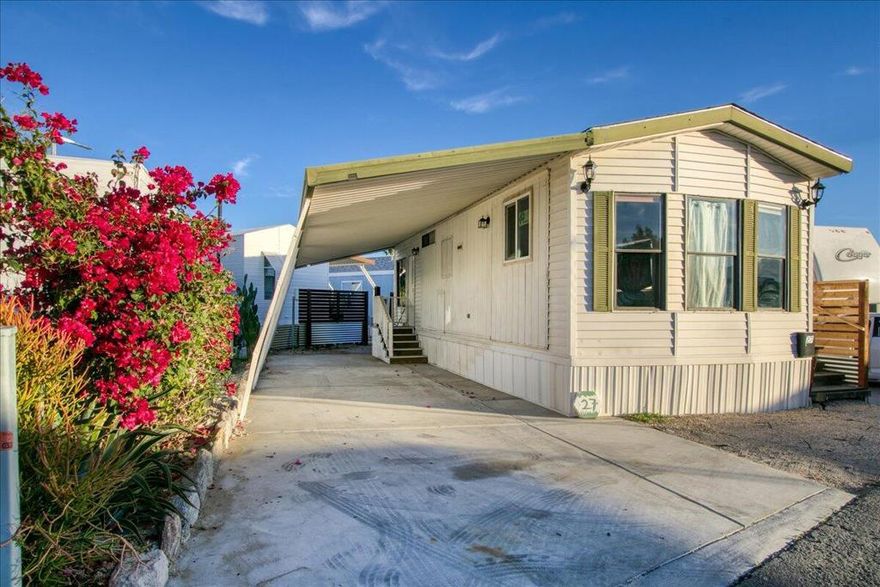 You are welcome to come see this newly remodeled beautiful turnkey home. Come see for yourself this open floor plan with newly designed kitchen & bathroom. A great location in the Oasis Hot Springs Mobile Home & RV Park, a resort-style community for ''all ages'' . This community offers a natural Hot Springs Spa that is over 18,000 gallons, and is the largest natural hot spa in the valley. Drive up to a beautifully landscaped 1-Bedroom/1-bath home w/ a large covered carport and newly built privacy fence around the yard. Recently landscaped, is an aesthetically  pleasing yard space with many possibilities, like a custom BBQ space. The new front porch and wooden steps create a stunning front entrance. You can take ownership, move in and relax in a move-in ready home. You'll find a carefully designed modern kitchen which host both well-crafted kitchen cabinets and new designer countertops. Enjoy the stainless steel large refrigerator, a new gas stove top, a space-saver modern microwave & vent hood, even a breakfast nook. The open living area has a view, vaulted ceilings, with room for TV, couches, and dinette. This home feels roomy and open. The upgrades are georgeous with new flooring and modern lighting fixtures throughout the home. Come pamper yourself in your Brand New bathroom with all new shower enclosure and raised showerhead. Plenty of room in this large single or double shower. This bathroom remodel includes new vanity sink, all new light fixtures, & hardware, even a toliet bidet. This well maintained home includes new roof, new water heater, dual pane windows, and fresh paint throughout. This home is perfect for those who want immediate gratification yet seeking both comfort and functionality. Come see for yourself, you'll find yourself saying, ''This is it!'' If you want to live a luxury lifestyle that's affordable, make this your new home in beautiful Oasis Hot Springs Mobile Home & RV Park. A low space rent includes resort-style ammenities!A BoaVida Community....Oasis Hot Springs Mobile Home and RV Park is an all ages community located in Desert Hot Springs, California. This community offers a Natural Hot Springs spa that is over 18,000 gallons and is the largest natural hot spa in the valley. The pool is 55,000 gallons and has a covered multi-purpose room. Pets are welcome.Enjoy a luxury lifestyle that's affordable. Call and schedule showing, 2 hour notice please.