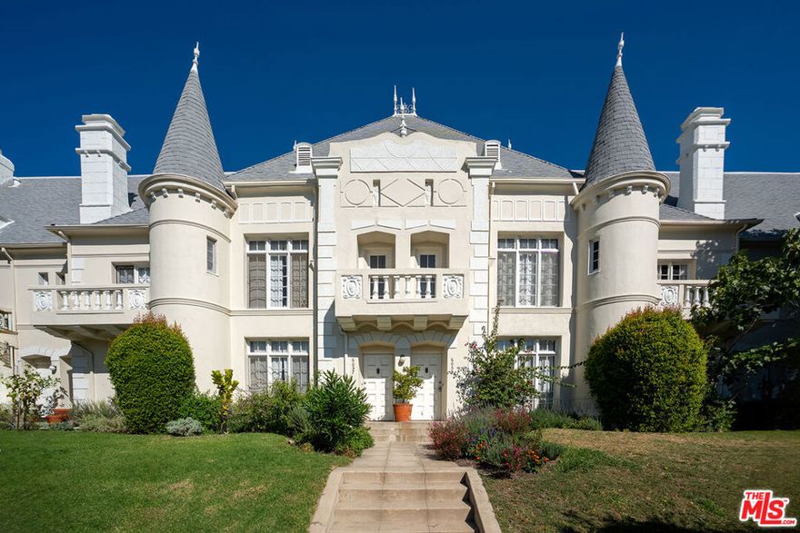 Discover the charm of Chateau Beachwood, a beautiful 2-bedroom, 2-bathroom townhome in Beachwood Canyon with classic French Normandy architecture, available for short-term rental. This historic-style home is rumored to have been built by Warner Bros. to house their female stars, including Marilyn Monroe and Greta Garbo. Madonna and Sean Penn also reportedly resided at this property. The oversized bedrooms and updated bathrooms make for a comfortable stay. Enjoy the private spacious backyard, perfectly suited for entertaining with outdoor furniture, barbecue, and string lights. Inside, the kitchen is equipped with premium Miele appliances. Ideally located near Hollywood recording studios, stunning hiking trails, Franklin Village, The Hollywood Bowl, Greek Theatre, Griffith Park, and more. A unique retreat filled with Hollywood history and modern amenities.