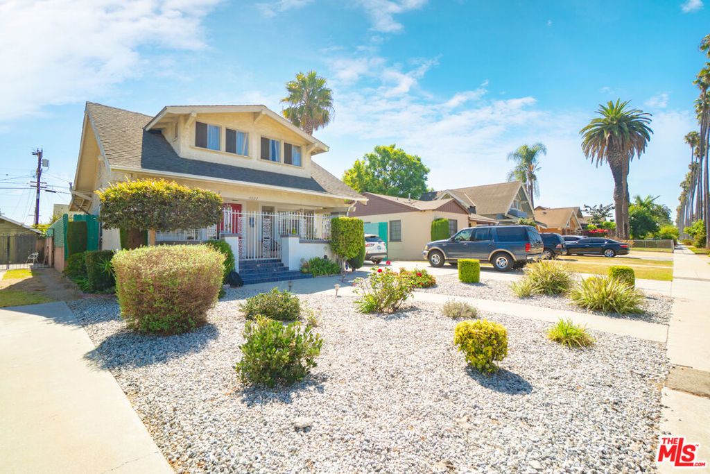 Photo of 4822 Cimarron Street, Los Angeles, CA 90062 (MLS # 25585347)