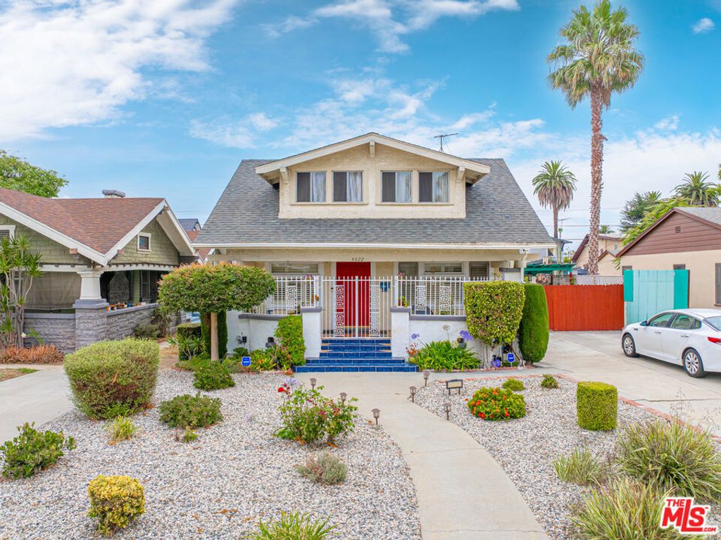 Photo of 4822 Cimarron Street, Los Angeles, CA 90062 (MLS # 25585347)