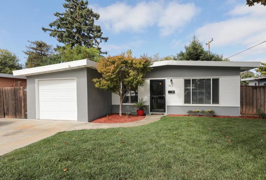 Move right in to this beautifully remodeled single family home. Light & bright, this home offers three bedrooms & one bathroom with plenty of room to expand in the future. Remodeled kitchen with white cabinets, quartz countertops & gas range. Spacious living room with laminate floors and open beam ceilings. Updated bathroom featuring tub/shower with tile surround. Newer paint & carpet, dual pane windows & more. Landscaped front & back yards. Easy access to trails & transportation, walk to parks, close to Google, downtown and all the wonderful amenities Mountain View has to offer.