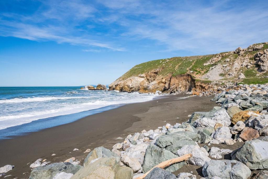 Fantastic opportunity to invest in mixed-use use Leed* Gold Certified Building in Pacifica. Located just 15 minutes south of San Francisco, 411 Dondee is nestled in Rockaway Beach, a transcendent retreat for those who want to get away. The area is uniquely positioned to capture the overflow of San Francisco's skilled, high-earning workers, who are seeking a more peaceful lifestyle by the coast and don't want to utilize overly congested commuter pathways. Each building features 1 retail/office space with a private restroom, and a spacious residential unit, two of which are townhouse style. The owner & builder invested in high-end finishes, open beam ceilings, in-unit washer & dryers, and floor-to-ceiling windows to highlight the ocean views.