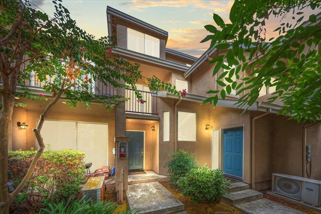Adorable one bedroom home located in fabulous location in the back of complex in a quiet location. Home features gleaming hardwood floors, open light and bright floor plan and cozy gas fireplace in living room living room opens to sunny balcony for BBQing. Enjoy your open kitchen with tons of storage , gas range, breakfast bar, quartz counters and extra shelving. Primary suite is extra large, enough room for an office too, walk-in closet plus an added second closet. Remodeled bathroom with modern stone shower and duel sinks. 2 car garage plus extra room. for workout area or more storage. Space to park in driveway too. HOA has relaxing pool and Spa across the street from home.