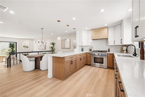 Photo of 5711 Owensmouth AVE #125, Woodland Hills, CA 91367 (MLS # SR26160490)