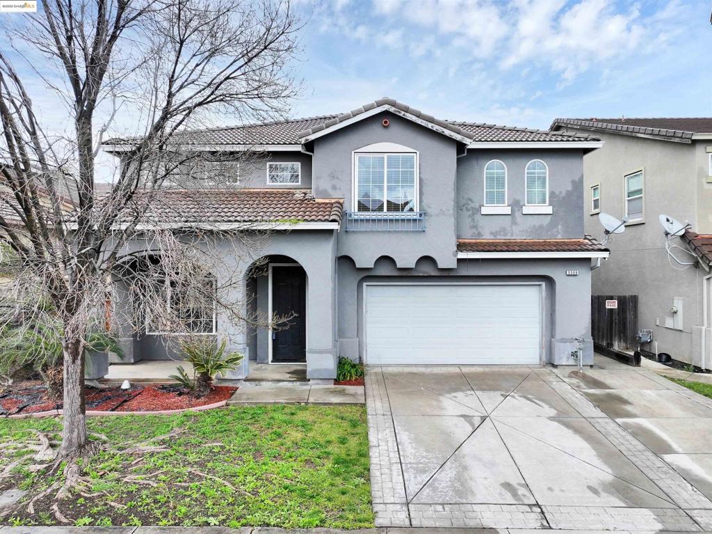 Located in a gated community with 24 hour security and gorgeous lakes, this four bedroom, three bathroom home with a large loft is perfect for a family looking to enjoy a beautiful community with tons of amenities. You'll notice vaulted ceilings and natural light when you first enter, as the living room/dining rooms leads to an open kitchen with granite tile and stainless steel appliances with a large island that opens to a family room with a gas fireplace. The downstairs is rounded out with a bedroom, bathroom, laundry room, and garage access. Upstairs you'll find a huge loft, two bedrooms, a full bathroom, and master bedroom. The master bedroom has a sitting room that could be converted to it's own bedroom, full shower, soaking tub, and two walk in closets. The upstairs loft is perfect for entertainment, setting up a movie room, or making your customized game room. New HVAC recently installed and washer/dryer/fridge are included. The private community is fully gated with professional landscaping, parks, tennis courts, bocce, playgrounds, and several lakes to enjoy with walking/running trails and lighted fountains. The backyard has a covered patio and electric hookups for a hot tub on a concrete pad that's already poured.