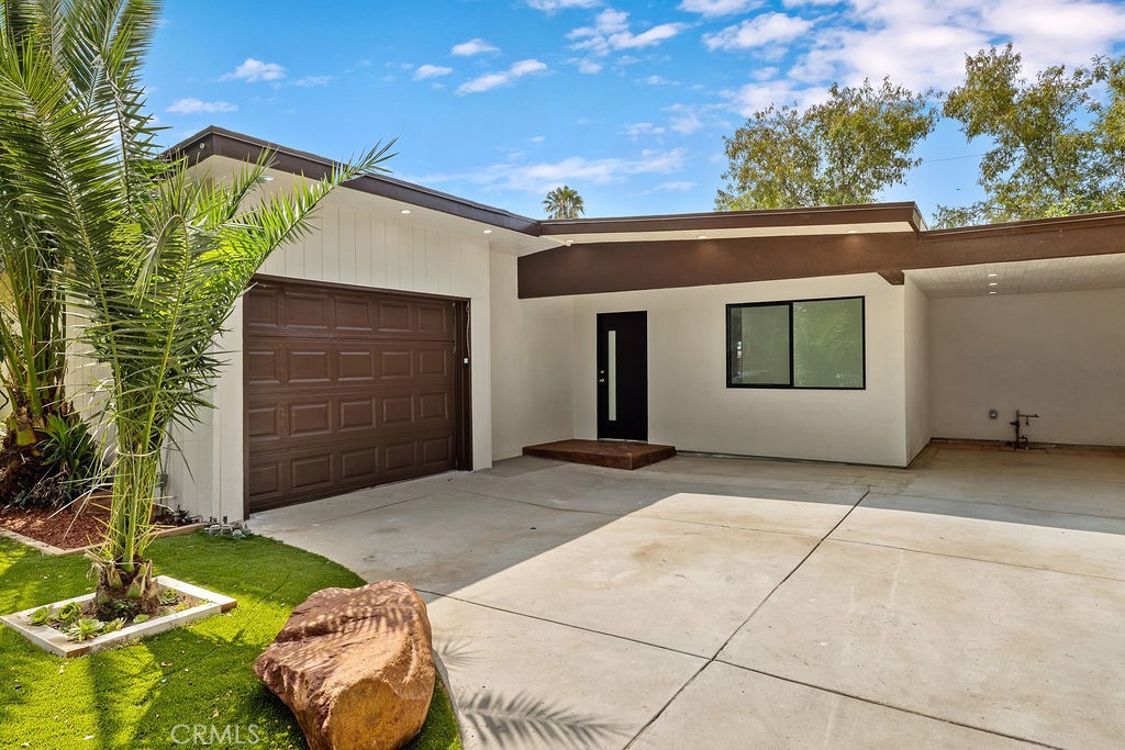 Welcome to 18720 Keswick Street — a spacious and beautifully updated 4-bedroom, 3-bathroom home offering 2,011 sqft of comfortable living in a prime Reseda location, just minutes from CSUN. Inside, you'll find a bright and open floor plan with recessed lighting, large living spaces, and a modern kitchen featuring stainless steel appliances, sleek countertops, and plenty of storage. The home includes a well-sized primary suite with an en-suite bath, along with three additional bedrooms perfect for family, guests, or a home office. Step outside to enjoy a private patio area, ideal for outdoor dining, entertaining, or quiet relaxation. With easy access to California State University, Northridge, shopping, dining, parks, and freeways, this home is perfect for families, students, or investors. Thoughtfully updated and move-in ready — this Reseda gem won’t last long!