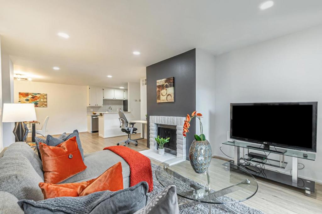 JUST REDUCED!! Stylish & Sophisticated 1-Bedroom Condo in Prime Location! -BLDG #2, UNIT 105 Discover comfort and elegance in this beautifully updated 1-bedroom, 1-bathroom first-level condo in the gated Mission Grove community. With 777 sq. ft. of thoughtfully designed living space, this home offers modern upgrades. The spacious living area features recessed lighting, wide plank laminate flooring, and a cozy fireplace, creating a warm and inviting ambiance. The gourmet kitchen boasts quartz countertops, a stunning mosaic backsplash, a brand-new range and hood, and crisp white cabinetry, perfect for cooking and entertaining. Throughout the home, designer touches include stylish accent walls, new light fixtures, recessed lighting, and a walk-in closet with built-in organizers, offering both style and functionality. A private patio provides the perfect space to unwind and enjoy tranquil evenings. Residents can take advantage of the community pool, ideal for summer relaxation. Conveniently located near Penitencia Creek Park, Alum Rock shops, and major commuting routes, including Capitol Expressway, 680, 101, and VTA Light Rail, this home offers both comfort and convenience. One dedicated parking spot and a small storage unit are included. Dont miss this incredible opportunity!