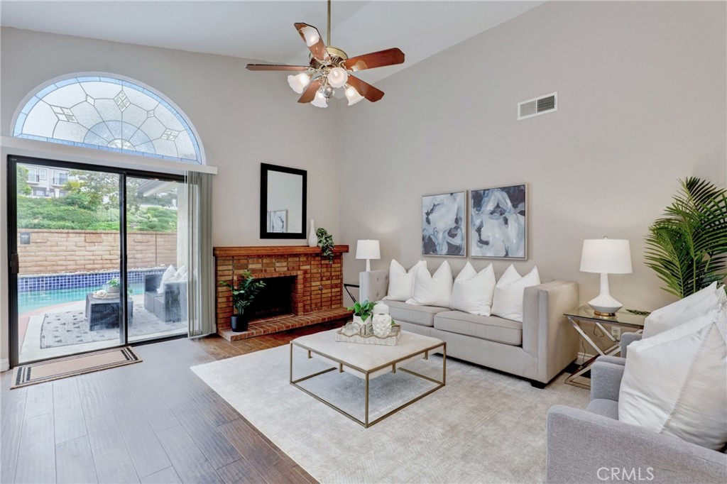 This inviting SINGLE LEVEL home in the sought-after Cortez neighborhood blends comfort, convenience, and California living at its best. With three bedrooms, two bathrooms, and a PRIVATE POOL, it offers the perfect setting for both everyday life and weekend entertaining. Just off the entry, a separate formal living room sets the tone with abundant natural light and a welcoming atmosphere. The home continues with an open floor plan that includes engineered wood flooring, neutral paint and carpet, shutters, and generous dining areas. A spacious family room with a cozy fireplace and sliding door to the backyard makes indoor-outdoor entertaining effortless. Outdoors, a sparkling pool is the centerpiece, surrounded by plenty of space for lounging, dining, and hosting gatherings—an ideal backdrop for warm Mission Viejo days. Well maintained and in good condition, the home also offers an excellent opportunity to update or personalize over time. All this in a prime location with Lake Mission Viejo membership, award-winning schools, nearby parks, shopping, and convenient freeway access. WELCOME HOME!