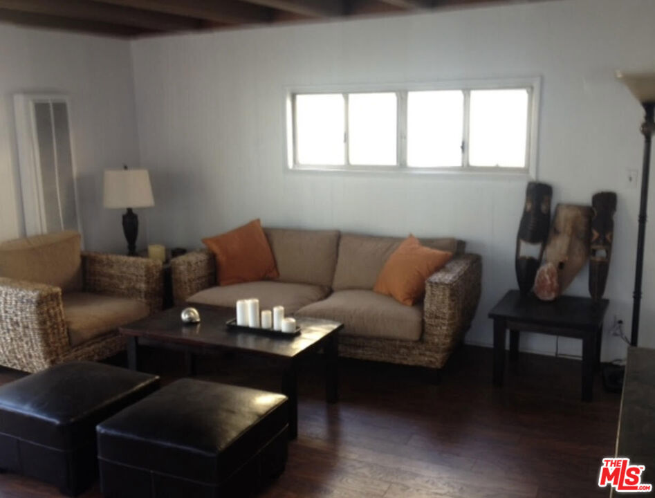 Balboa Peninsula best location. Park your car and walk/bike ever where. Across the street from retail center including Albertsons. Fully furnished.