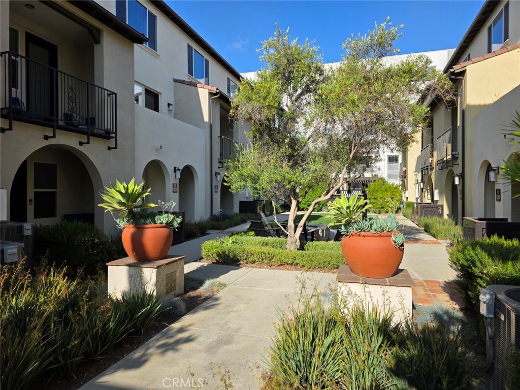 Welcome to this beautifully updated tri-level townhome, offering four bedrooms, four bathrooms, and just under 1,800 square feet of thoughtfully designed living space. This home is tucked inside a gated, well-maintained community that gives you both privacy and comfort.
As you enter on the first level, you're greeted by a spacious foyer, a large bedroom with a walk-in closet and en-suite bath, a generous utility closet, and direct access to the attached two-car garage—making everyday living incredibly convenient.
Upstairs, the main living area opens up with great natural light and a smart layout. The kitchen features granite countertops, stainless steel appliances—including a stove, microwave, dishwasher, and refrigerator—and a large island that's perfect for casual dining or entertaining. The dining area is positioned right off the kitchen, and on the other side, the living room leads to a private balcony that overlooks the community courtyard. This level also includes laminate flooring, a full bathroom, and a second bedroom with newer carpet and a spacious closet.
On the top floor, you'll find two more en-suite bedrooms, each with walk-in closets and clean, modern bathrooms. The laundry room is also upstairs and comes equipped with a newer washer and dryer, along with cabinet space for storage.
Outside, the community courtyard is peaceful and welcoming, with fruit trees, a covered patio, and a built-in BBQ—perfect for relaxing or entertaining guests.
And the location is hard to beat—just minutes from the 110 freeway, Harbor UCLA Medical Center, and a short drive to the beach, Del Amo Fashion Center, The Pike, and the Port of Los Angeles.
This is a fantastic opportunity to own a spacious, move-in ready home in a private and centrally located community.
