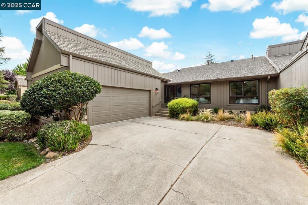 Welcome to 3158 Hambletonian Lane, a stunning four-bedroom, two-bath townhouse offering approx. 1,833 sq ft in Walnut Creek’s desirable Northgate subdivision. Elegant bamboo floors flow through light-filled living and dining areas centered around a striking marble-surround fireplace. An adjacent family room opens through French doors to a patio with terracotta tiles, OneLawn artificial grass, and a private hot tub -perfect for al fresco dining, relaxation, and low-maintenance living. The updated kitchen features abundant cabinetry, premium appliances, and a cozy breakfast bar. The primary suite includes French doors to the yard, large double closets, and a remodeled ensuite with dual vanities and a walk-in shower. Two additional bedrooms are generously sized, while the fourth has been converted into a versatile office with a nook ideal for a pull-out bed or lounge seating. The hall bath also offers a walk-in shower. Added highlights: updated lighting and hardware, a whole-house fan, and a garage with shelving, bike hoists, and an EV charger. Community amenities include an equestrian center, tennis courts, pool, and open space with trails—all for $630/month HOA dues. Enjoy privacy and convenience near parks, shopping, dining, and freeway access. Don’t miss this exceptional home!