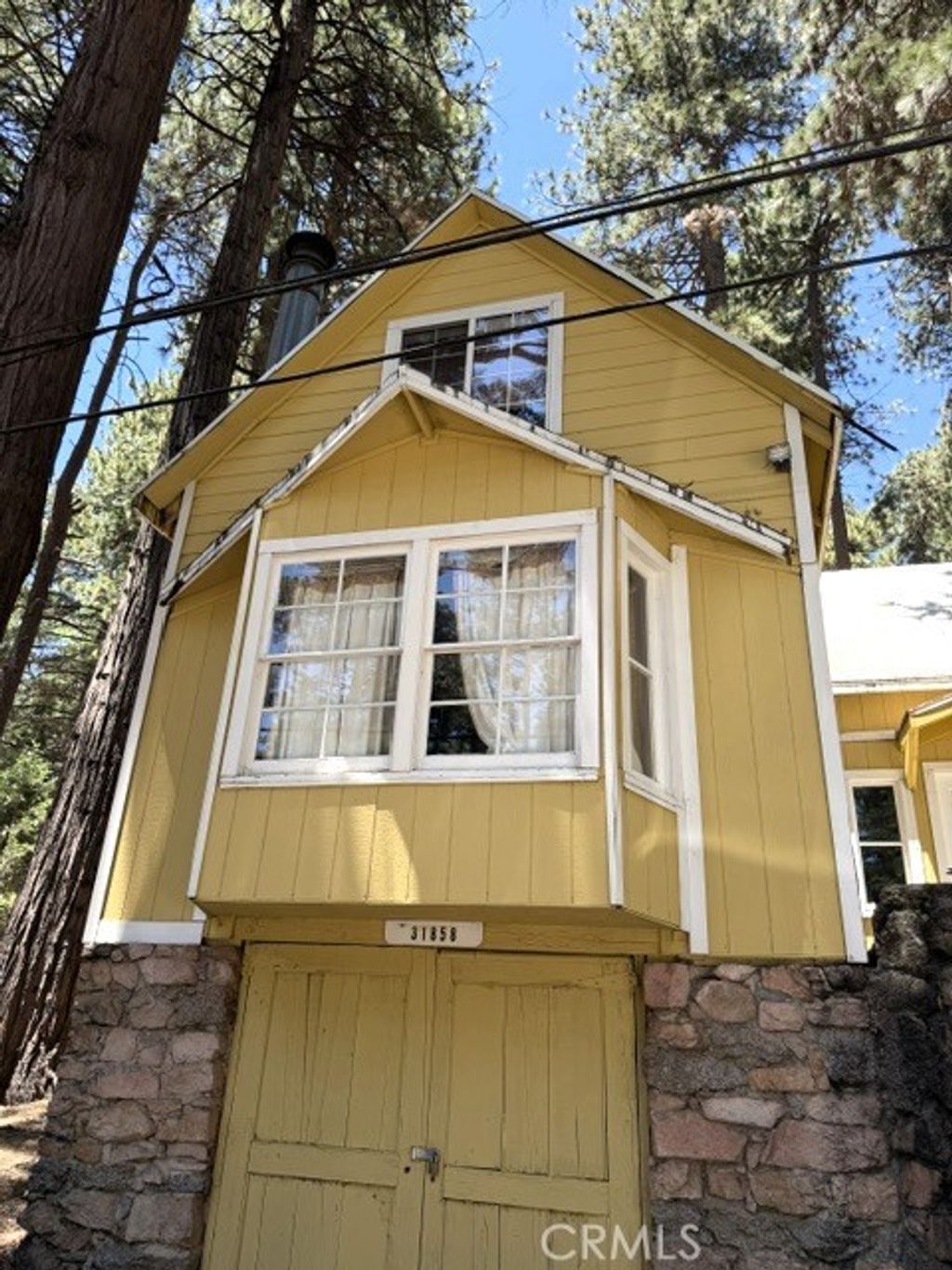 Photo of 31858 Hollow Way Way, Running Springs, CA 92382 (MLS # IV26130283)