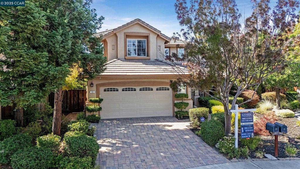 Beautifully situated in Danville’s sought-after East facing Tassajara Ranch, this home offers a bright and versatile floor plan close to top-rated schools, shops, and dining. Tall ceilings welcome you into the formal living and dining room combo, creating an open, airy feel. The updated kitchen features fresh countertops and paint, flowing seamlessly into the family room with views of the backyard. A main-level bedroom and full bath with stall shower provide ideal space for guests or in-laws. Upstairs, the spacious primary suite includes a walk-in closet, soaking tub, stall shower, and dual-sink vanity. Two additional bedrooms share a Jack & Jill bath with double vanity and shower over tub. The backyard is designed for both play and entertaining, with two large patio areas—one just outside the family room and another with a pergola—plus an artificial turf space. Enjoy access to community amenities including a pool, nearby Diablo Vista park which offers a playground and multiple sports fields and courts.