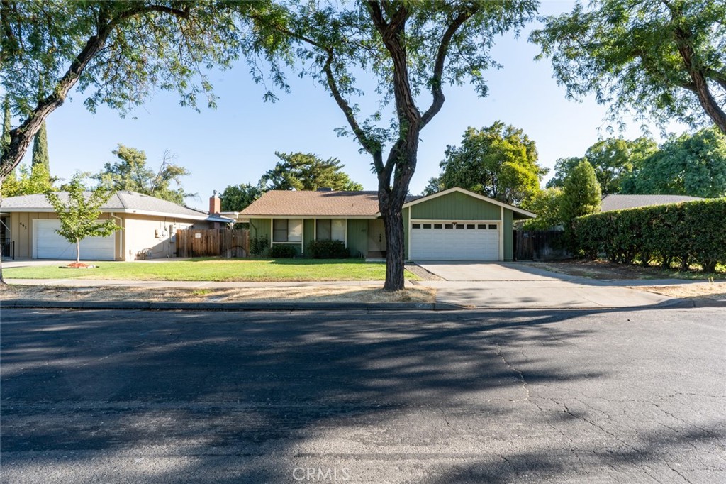 Welcome to 677 Northwood Dr, a charming single-story home in a peaceful neighborhood with a spacious lot and mature fruit trees. Enjoy a bright living room with a brick fireplace, an updated kitchen with modern appliances, and two functional bathrooms (one with a tub/shower, one with a shower). The three bedrooms offer ample space, complemented by tile and hardwood flooring. The large backyard is perfect for relaxation or outdoor fun. Conveniently located near amenities, this home is ready for you—schedule a viewing today!