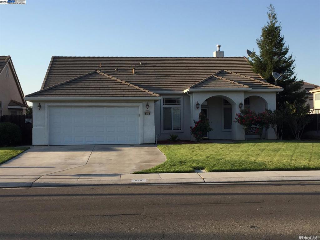 Well-maintained single-story home in a desirable Manteca neighborhood. This property offers 4 bedrooms, 2 bathrooms, and approximately 1,801 square feet of living space. Built in 2002, the home is situated on a large 9,030 square foot lot. The home features a functional layout with an open living and dining area, a spacious kitchen with ample cabinetry, and a primary suite with en-suite bath and walk-in closet. Additional highlights include a new water heater, central HVAC, and an indoor laundry room. Owned solar panels provide energy efficiency and currently cover the full electricity bill. The property also includes an attached two-car garage and a generously sized backyard with room for entertaining or expansion. Conveniently located near Union Road, a main thoroughfare, with close access to parks, shopping centers, schools, and more. The interior includes an open living and dining area, a functional kitchen with ample cabinetry and counter space, and a comfortable primary suite with en-suite bath and walk-in closet. Additional features include indoor laundry, attached garage, and central HVAC. Conveniently located near schools, parks, shopping, and freeway access.