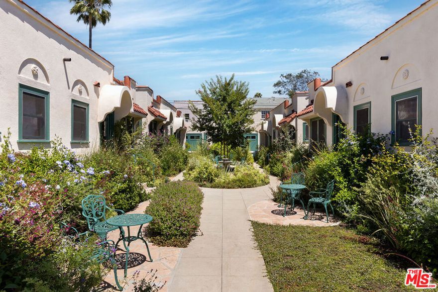 A rare opportunity to acquire a luxurious, restored 1923 Spanish Revival courtyard complex in the heart of the city  perfect for a multi-generational or extended family compound, a buyer seeking guest residences for visiting friends or relatives, a collector of legacy architecture, or even a foundation or institution looking to house visiting fellows, artists, or scholars. The property also offers compelling potential for investors, with high-end finishes, vacant delivery, and flexible use options that make it attractive as both a residence and an income-producing asset. The historic Edinburgh Bungalow Court is a designated Los Angeles Historic-Cultural Monument and recipient of the Los Angeles Conservancy's 2023 Preservation Award. The property consists of four structure seach with two side-by-side 1BD/1BA residences (approximately 532 sq ft each)arranged around a serene, gated courtyard. Every unit has been luxuriously and thoughtfully restored to showcase period authenticity with modern conveniences: handmade wood windows and doors with wavy glass, lathe-and-plaster walls, light sand-finished ceilings, Claycraft tile, and vintage vertical-grain Douglas fir cabinetry. White oak hardwood flooring runs throughout the living areas, while bathrooms feature classic clawfoot tubs and octagonal tile floors. Kitchens are outfitted with Sub-Zero refrigerators, built-in wood-paneled dishwashers, and vintage, fully restored O'Keefe & Merritt double ovens. Each unit includes its own private laundry room with washer/dryer. The renovation extends well beyond aesthetics, incorporating major system upgrades and infrastructure improvements throughout. Each unit has its own electrical meter, and all eight benefit from brand-new central air and heating systems. Six garages (with 220V plug for EV charger), two surface parking spaces, and a bonus studio unit near the garages  ideal as a shared community room, office, or creative space  complete the offering. All units are currently vacant and ready to be leased or occupied immediately. Located just north of Melrose and west of Fairfax, the property sits in a walkable, design-forward enclave where offerings of this caliber are exceedingly rare. A unique chance to own a fully restored historic property that combines architectural integrity with modern luxury  suitable for personal use, income, or long-term legacy.