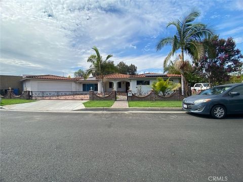 Photo of 9017 Arrington Avenue, Downey, CA 90240 (MLS # RS25219725)