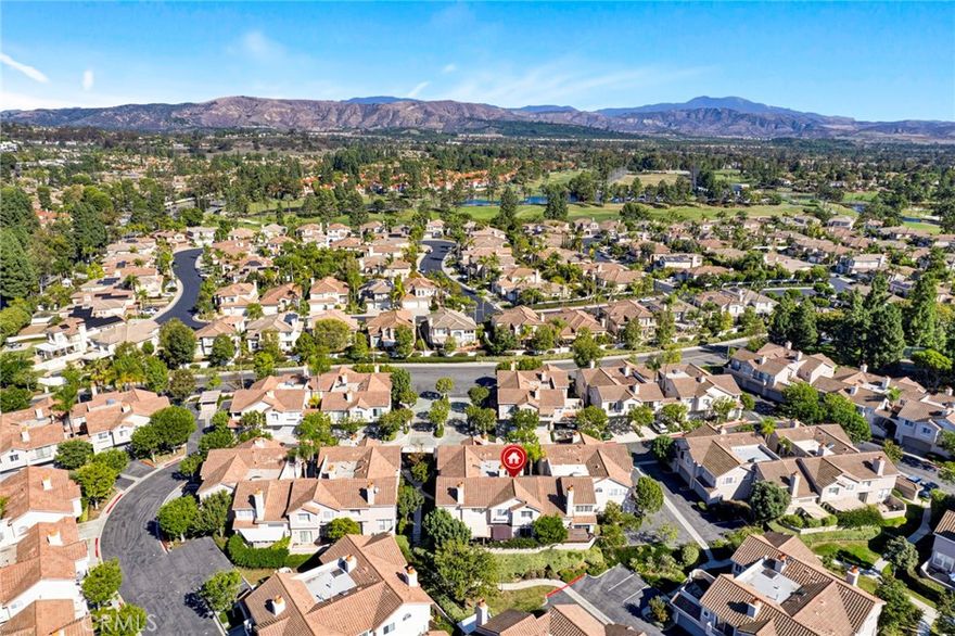 Welcome to 2346 Tryall, Located in the Highly Desirable Gated Ventana Community of Tustin Ranch. This Immaculate Turn-Key Home Sits on an Elevated Interior Lot with No Neighbors Above or Below, Featuring Two Bedrooms, Two and a Half Bathrooms, Hardwood Floors, New Carpet, New HVAC, and New Interior Paint. The Open Floor Plan Offers a Spacious Family Room and Dining Area With Crown Molding, a Cozy Fireplace, and Backyard Access. The Remodeled Kitchen Showcases Quartz Counters, Stainless Steel Appliances, Ample Cabinet Space, Backyard Access, and Overlooks the Family Room Which is Perfect for Entertaining. The Master Suite Enjoys a Vaulted Ceiling, Plantation Shutters, Two Mirrored Closets, Dual Vanities, and Remodeled Shower. The Secondary Bedroom Enjoys Two Mirrored Closets and an En-Suite Bathroom with Walk-In Shower. Indoor Laundry Room with Storage and Direct Access Two Car Garage Complete with Built-In Cabinets and Epoxy Floors. The Private Backyard Includes a Paver Patio and Pergola. HOA Amenities Include a Gated Entrance, Resort Style Pool/Spa, Grass Picnic Area, Tennis Court, and Playground. A Short Walk/Drive to Award Winning TUSD Schools, Tustin/Irvine Marketplace, Two Costcos, Tustin Ranch Golf Course, Irvine/Peters Canyon Regional Parks, and Hiking/Biking Trails. Easy Access to 5/55/405 Freeways and 241/261 Toll Roads. 2346 Tryall is a Must See!