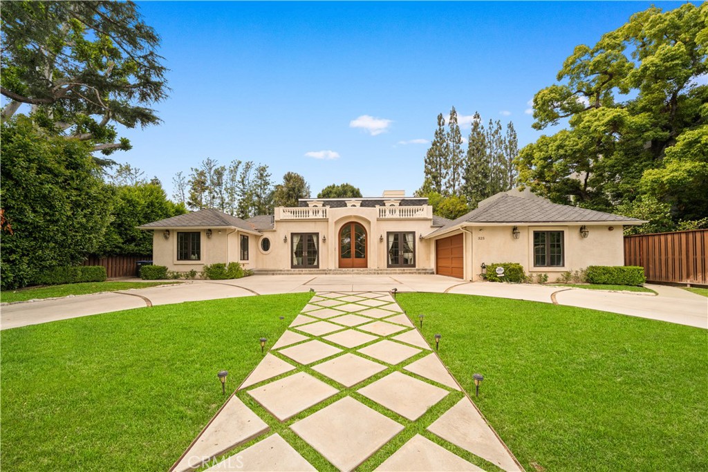 A rare offering in one of Pasadena's most coveted neighborhoods - this French chateau- inspired estate blends European elegance with modern sophistication. 6 beds, 7 baths, 4,894 sq ft of masterful design. Lot size 16910 SFT. From custom stone finishes to a seamless indoor - outdoor flow with 23 ft. of bi-fold doors, every detail speaks of refinement. Complete with Viking appliances, smart home systems, and a resort- style pool retreat. Situated at the iconic starting point of the annual Rose Parade, this is not just a home - it's a front-row seat to Pasadena tradition, prestige, and lifestyle.