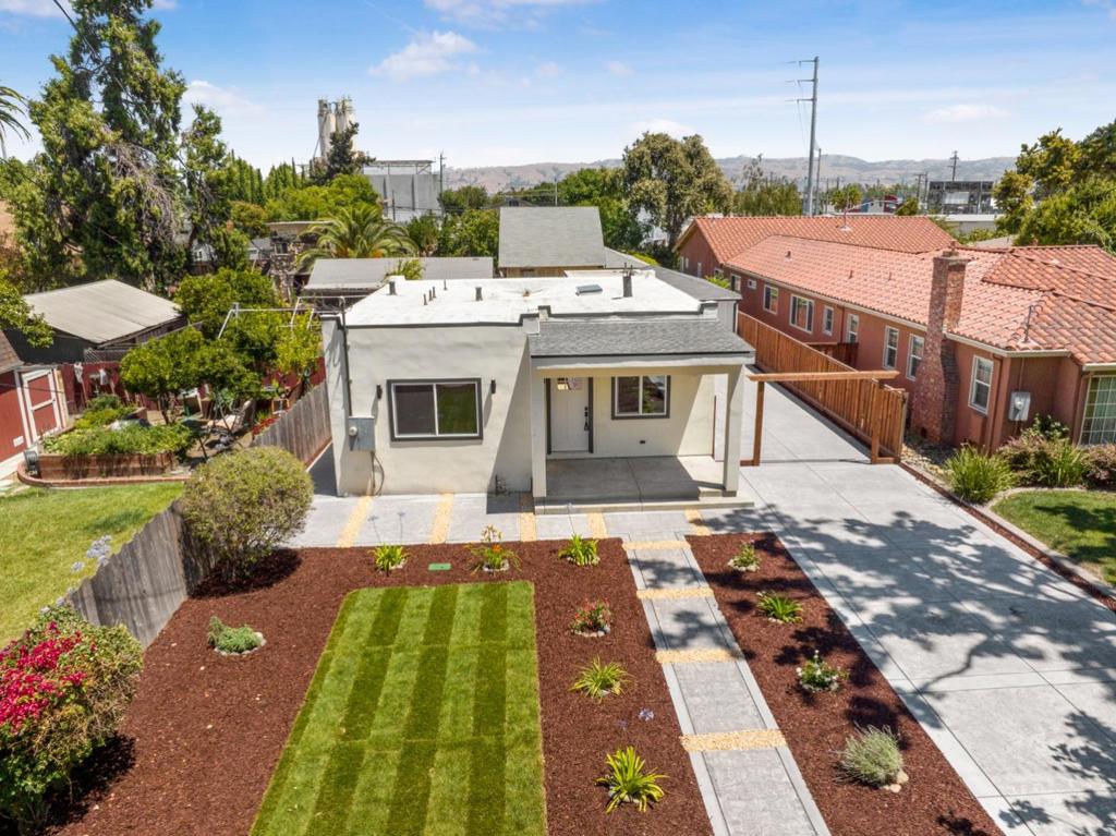 Beautifully remodeled for 2025, this thoughtfully curated 2-bedroom, 2-bath single-story home blends style, function, and comfort. Located in a desirable neighborhood, the home features an open and airy layout filled with natural light. The spacious living area flows seamlessly into a modern kitchen with new appliances, perfect for todays lifestyle. Both bedrooms are generously sized, and the bathrooms have been tastefully updated. The garage has been converted into a flexible bonus space, ideal as a home office, gym, or creative studio. Step outside to a private backyard retreat, perfect for relaxing or entertaining. A rare find that combines timeless design with modern updates.