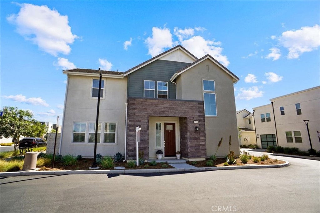 ASSUMABLE LOAN 4.5% fixed (not required, new financing or cash acceptable too). Welcome Home! This beautifully crafted 3-bedroom, 3.5-bathroom residence spans 2,481 square feet, offering a perfect blend of luxury, comfort, and convenience. Expansive primary bedroom featuring a custom accent wall and a luxurious ensuite with a separate shower, soaking tub, and spacious walk-in closet. Each additional bedroom includes its own private bathroom. Built by Lennar in 2022, this home features contemporary design and premium finishes, making it an ideal choice for buyers seeking a move-in-ready property. The expansive great room flows seamlessly into a gourmet kitchen, featuring a large island, granite countertops, stainless steel appliances, and ample cabinetry—perfect for entertaining or daily living. Large windows fill the home with natural light, enhanced by high ceilings, recessed lighting, creating an inviting and elegant atmosphere. Equipped with solar panels, a tankless water heater, and ENERGY STAR-qualified appliances, this home promotes eco-friendly living and lower utility costs. Enjoy a low-maintenance, drought-resistant landscaped yard, perfect for relaxation or gatherings. Includes a two-car attached garage, an upstairs laundry room with folding space and cabinetry, and copper plumbing throughout. Residents enjoy proximity to Confluence Park, located at 27188 Middleton Street. Includes a junior Olympic competition pool, an adult swimming facility, and a family-friendly pool with a spa, surrounded by poolside cabanas, a covered pool bar/BBQ area, and showers. A 3,700 sq. ft. lounge hosts resident functions, seasonal events, and casual gatherings, with interiors designed for comfort and scenic mountain views. This beautiful home is freeway-close and is also served by award winning schools.