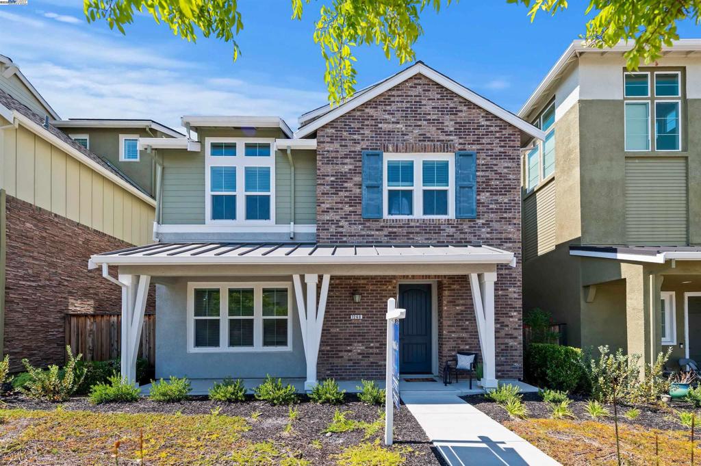 Welcome to this rare Plan 3 model in the highly sought-after Wallis Ranch community in East Dublin. This expansive and versatile floor plan features a full bedroom and bath on the main level, along with a convenient powder room. The heart of the home is the chef’s kitchen, complete with an oversized 9.5' x 4' island, breakfast bar, stainless steel GE appliances including two ovens and a gas cooktop, plus a walk-in pantry. Large sliding doors lead out to the private yard. Upstairs, the luxurious primary suite boasts a spacious bathroom with dual vanities, a stand alone tub and seperate shower, and a large walk-in closet. The second floor also includes a generous loft, two additional bedrooms, and a full bathroom. The third floor offers a private guest suite with its own bedroom and full bath—ideal for multi-gen living or visiting guests. Designer touches throughout include luxury vinyl plank flooring, tile, Hunter Douglas window coverings, and a finished garage. Enjoy all the amenities Wallis Ranch has to offer—pool, cabana, parks—and close proximity to top-rated Dublin schools, freeways, BART, shopping, parks and more!