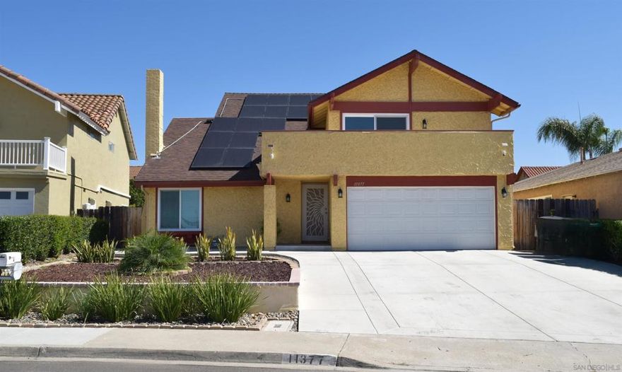 This two-story home is located in the highly desirable Mira Mesa neighborhood and offers 4 bedrooms and 2 1/2 bathrooms. Since 2023, the current owners have completed numerous upgrades, including fully owned solar panels, upgraded kitchen cabinetry with stainless steel appliances, dual pane windows and doors throughout, laminate wood flooring in the upstairs and living room, tiled family room and kitchen, a remodeled patio structure, and new concrete work surrounding the front, back, and 1 side of the property.  All bedrooms are situated on the upper level, with the primary suite featuring a private balcony. At the top of the stairs, a versatile second family room or loft provides flexible space suitable for use as a play area or office. The backyard boasts a covered patio, three storage sheds, and fruit trees. The property is conveniently located near Ericson Elementary School, Mesa Viking Park, and is a short drive from shopping and dining options. No HOA.  All bedrooms are situated on the upper level, with the primary suite featuring a private balcony. At the top of the stairs, a versatile second family room or loft provides flexible space suitable for use as a play area or office. The backyard boasts a covered patio, three storage sheds, and fruit trees. The property is conveniently located near Ericson Elementary School, Mesa Viking Park, and is a short drive from shopping and dining options. No HOA.