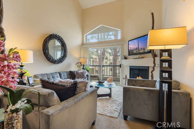 BEST VALUE IN THE MET! 2 BR UNIT PLUS ADDITIONAL LOFT UPSTAIRS! HOA HAS NEW INSURANCE POLICY WITH $500M IN PROPERTY COVERAGE! This rare offering in the Met showcases serene pool and treetop views from an incredibly private setting with a balcony that does not directly face another. This top floor unit features the highly sought after "2F” floor plan which features dual master suites with one having a large walk-in closet. This is the preferred floor plan for units with lofts because it has the preferred dining room area compared to the other 2 bedroom with loft layout. From the moment you enter, you will notice the functionality and storage offered by this floor plan. This top floor unit features HIGH CEILINGS and an open floor plan with an additional loft space perfect for an extra guest room, office or ??? Features include: Convenient Location Close to ELEVATOR, 2 Car COVERED Assigned Parking, private IN UNIT LAUNDRY (new washer & dryer 2025) and stainless appliances. The private balcony offers the perfect space to dine al-fresco and bask in the beautiful year-round weather that Woodland Hills has to offer. Now is the time to invest in Warner Center, which is home to the LA Rams, spectacular future development plans, many large corporations with great employment bases and easy access to freeways and public transportation! This is the perfect place to call home or as an investment with a bright future. HOA dues include water, sewer, trash and earthquake insurance.
The Met, situated in the highly prestigious Warner Center, is an exclusive, guard-gated community spread across 26 acres of verdant grounds. The community consists of resort-style amenities including four pools, state of the art fitness center, six fully lit North/South tennis courts, children's playground, expansive poolside deck, indoor basketball court and racquetball court all while being minutes to local shopping, dining and entertainment in the heart of the San Fernando Valley. A true getaway that you can call home.
Please note tax assessor data lists property as a 2 Bedroom unit. Believed not to include the upstairs loft.