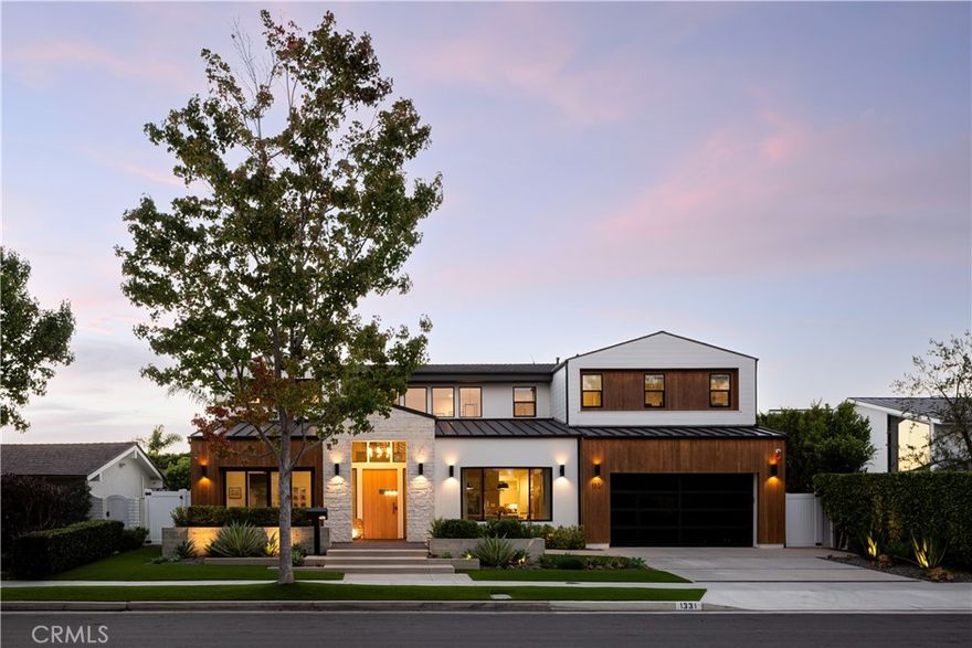 Tucked away on a quiet, desirable street in Dover Shores, 1331 Antigua Way embodies modern coastal luxury at its finest. Built in 2022 and designed by Morrison Interiors, this architectural masterpiece spans approximately 4,800 square feet, offering 6 bedrooms and 6.5 bathrooms of refined living. Light fills the open floor plan, where soaring ceilings and clean lines flow effortlessly into an expansive California room that defines true indoor-outdoor living. Here, days unfold around the pool and spa, with spaces designed for gathering, relaxing, and entertaining under the Newport Beach sun. At the heart of the home, the chef’s kitchen stuns with dual Calacatta porcelain waterfall islands, custom cabinetry, and designer lighting, crafted for both beauty and function. Every detail reflects thoughtful design, from the bonus casita to the Control4 smart system, solar power, soft water tanks, and EV charging port in the three-car tandem garage. 1331 Antigua Way isn’t just a home, it’s a modern sanctuary designed to elevate everyday living in one of Newport Beach’s most coveted communities.