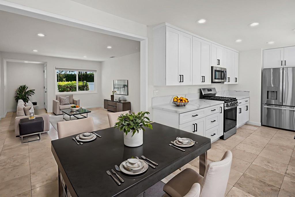 Nestled in the heart of North Torrance, this beautifully updated single-level home offers a seamless blend of timeless charm and modern comfort. Boasting three comfortable bedrooms and two elegantly remodeled bathrooms, the home features rich travertine tile flooring in the common areas, new luxury vinyl flooring in the bedrooms, and new paint throughout the interior and exterior of the home. The kitchen was renovated in June of 2025 and is bright and airy with all new appliances and design features, ideal for both casual dining and everyday living. A generously sized primary suite includes a walk-in closet and private bath, while the attached two-car garage and gated yard provide added privacy and functionality - also great for entertaining! Just moments from award-winning schools, parks, and freeway access, this turnkey residence is a rare opportunity in this highly sought-after central neighborhood.