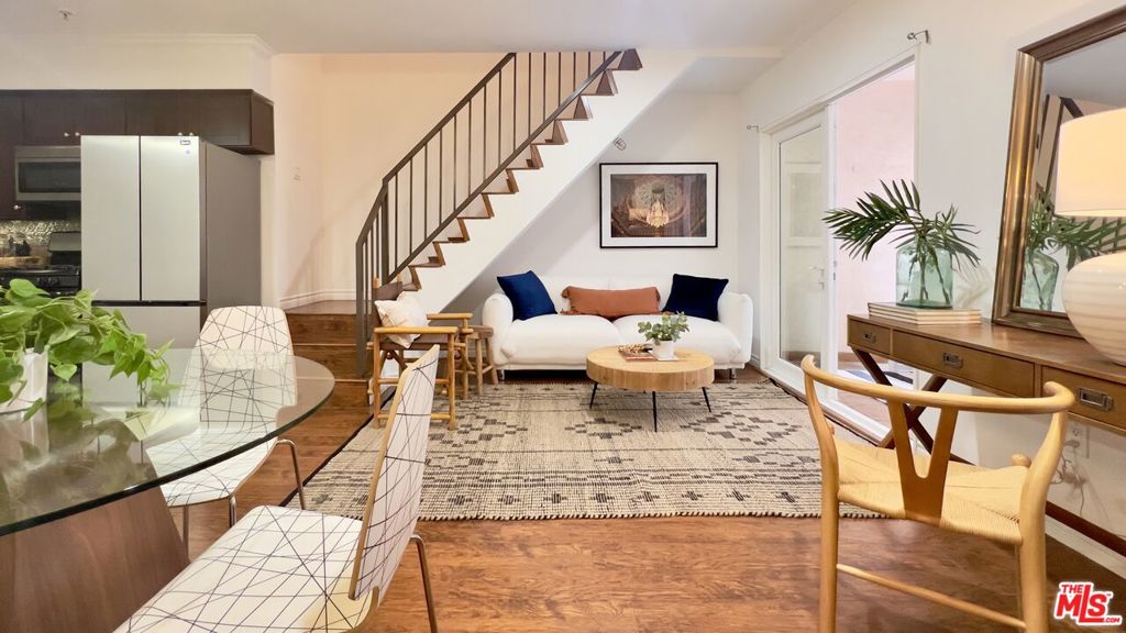 2 story condo with 2 private en-suite bedrooms, guest powder room, open living area, in-unit washer/dryer, and 2 secured parking spots.Walk to shops, gyms, yoga, restaurants & the Walk of Fame.Turnkey. Secure. Stylish. Ready for you.