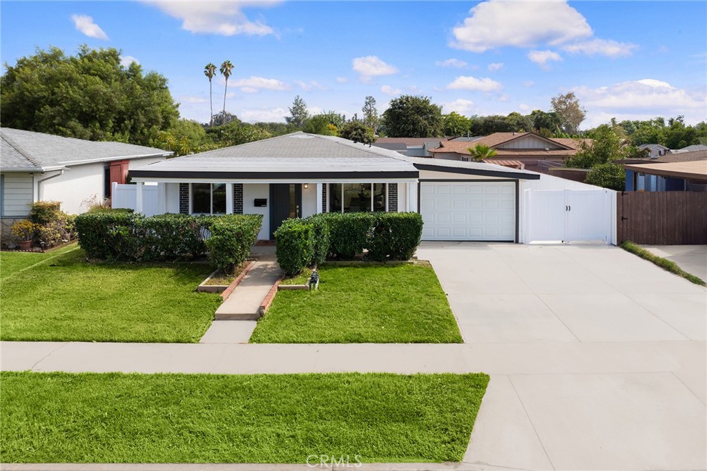 The thoughtfully designed single-level residence located in the heart of Baldwin Park, features 4 spacious bedrooms and 2 stylish bathrooms. Stepping through the elegant porch and the front entrance, the living room with light pouring through the windows welcomes you. The open-concept kitchen is completed with premium stainless-steel appliances, waterfall island with cabinets and granite countertop, adjacent to the cozy dining area. The three generous bedrooms across from the bathroom which features sensor lights, dual sink, anti-fog mirror with LED light, standing shower with elegant glass door and modern fixtures. The floor-to-ceiling windows in the spacious primary suite create a seamless connection between indoor and outdoor. The master bathroom is fitted with a lighted, anti-fog mirror, good-sized sink, custom designed cabinet and elegant standing shower. The spacious backyard is perfect for future development of addition or ADU, family reunion or relaxation. The attached garage is finished with a new garage door and drywall, fits the laundry. The whole house has been updated with all new floors throughout, interior painting, exterior stucco, brand new split AC, plumbing, electric rewiring, new gas line, double-pane windows and doors. The extra wide frontage (57’) provides a driveway to the backyard. The house is located close to schools, parks, highways and shops, such as Home Depot, Walmart, Target. Come and discover this gem.