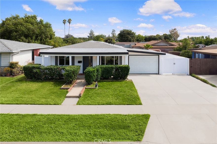 The thoughtfully designed single-level residence located in the heart of Baldwin Park, features 4 spacious bedrooms and 2 stylish bathrooms. Stepping through the elegant porch and the front entrance, the living room with light pouring through the windows welcomes you. The open-concept kitchen is completed with premium stainless-steel appliances, waterfall island with cabinets and granite countertop, adjacent to the cozy dining area. The three generous bedrooms across from the bathroom which features sensor lights, dual sink, anti-fog mirror with LED light, standing shower with elegant glass door and modern fixtures. The floor-to-ceiling windows in the spacious primary suite create a seamless connection between indoor and outdoor.  The master bathroom is fitted with a lighted, anti-fog mirror, good-sized sink, custom designed cabinet and elegant standing shower. The spacious backyard is perfect for future development of addition or ADU, family reunion or relaxation. The attached garage is finished with a new garage door and drywall, fits the laundry. The whole house has been  updated with all new floors throughout, interior painting, exterior stucco, brand new split AC, plumbing, electric rewiring, new gas line, double-pane windows and doors.  The extra wide frontage (57’) provides a driveway to the backyard. The house is located close to schools, parks, highways and shops, such as Home Depot, Walmart, Target. Come and discover this gem.