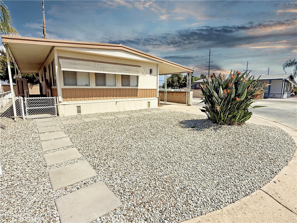 Price REDUCED! Welcome to Hillside Mobile Home Estates, one of Menifee’s premier 55+ gated communities. This updated 2-bedroom, 1-bath home is ideally situated on a desirable corner lot, offering added privacy and natural light. Enjoy charming curb appeal with a freshly painted exterior, new front porch, low-maintenance landscaping, and decorative stepping stones.
Inside, the open-concept layout is bright and functional, featuring a bright kitchen with newer countertops and modern finishes and an updated bathroom for added comfort. Both bedrooms include walk-in closets. Additional improvements include a new water heater and energy-efficient lighting throughout.
This home offers a low-maintenance lifestyle, ideal for full-time living or seasonal stays. Residents enjoy access to community amenities such as a clubhouse, pool, and billiards room. Conveniently located near shopping, dining, and freeway access. SELLER FINANCE AVAILABLE for qualified buyers.
Current space rent: $722/month. Don’t miss this move-in ready home at a great new price!