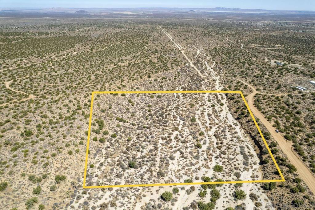 Embrace wide-open living with this 10-acre property in Llano, Los Angeles County, CA! Located off a dirt road with power lines nearby, this lot is zoned for heavy agricultural use. The terrain is expansive which offers flexibility for various projects in a peaceful desert setting. Situated near Mescal Canyon Reservoir and just off Highway 138, the property enjoys easy access to nearby communities like Pinon Hills, Phelan, and Wrightwood. You'll be close to outdoor recreation areas including Big Pines, Mt. Baldy, and the Angeles National Forest. Whether for agriculture or a private retreat, this property offers space and potential in a scenic location!