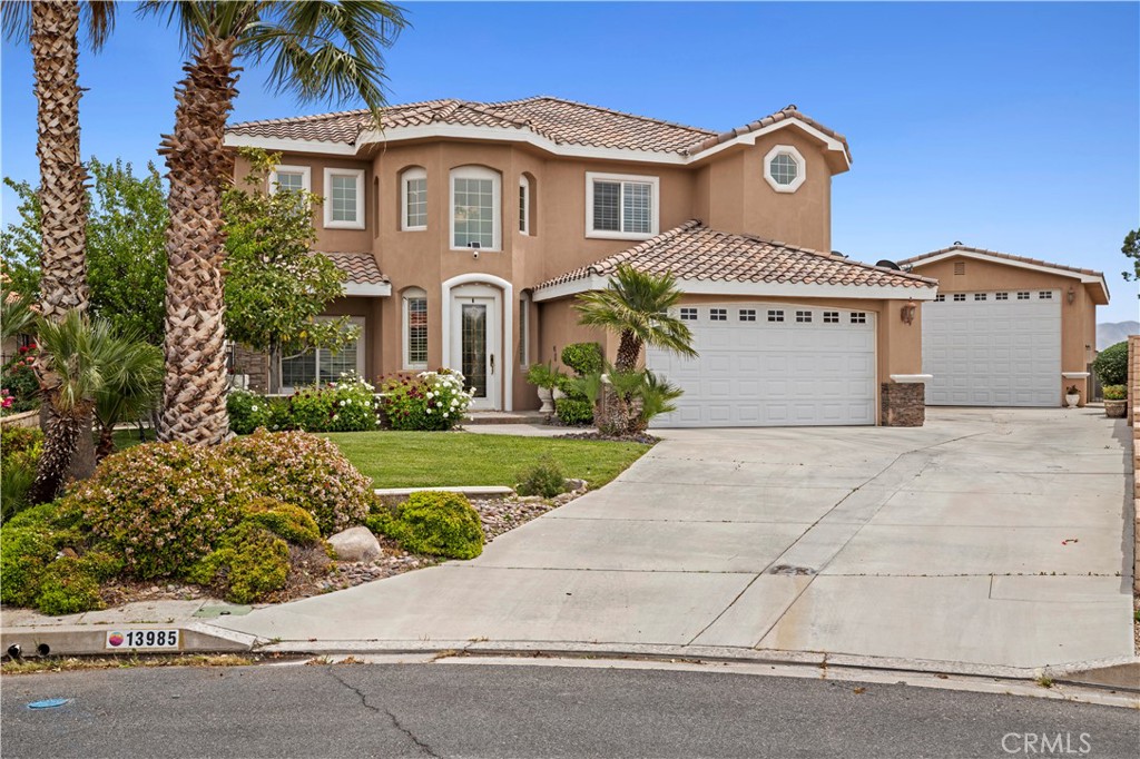 Amazing opportunity to own a jewel of a home in the highly sought after Spring Valley Lake community. This elegant home provides luxury & space for all your gatherings & entertaining. Large primary bedroom with private balcony to enjoy the expansive views of the lake. Hard to find RV garage & RV parking for a total of 2 garages. Step inside to discover high ceilings and a spacious layout that includes separate formal living & dining rooms, perfect for entertaining. The well-appointed kitchen boasts modern appliances, including a dishwasher, trash compactor & double ovens designed for both beauty and function. Outdoor enthusiasts will appreciate the expansive front and back yards, highlighted by the beautiful pool & spa. The community amenities are second to none. Enjoy a day at the private beach, tee off at the finest golf course in the high desert, (membership required) or engage in a friendly match on the tennis court. Additional features include a community pool, gym, racquetball courts, playground, and a media room/clubhouse, marina, beach & BBQ area. This is more than a home; it's a lifestyle. Experience the luxury of Spring Valley Lake living at its finest.