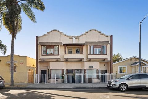Photo of 3877 Denker Avenue, Los Angeles, CA 90062 (MLS # SR25169386)