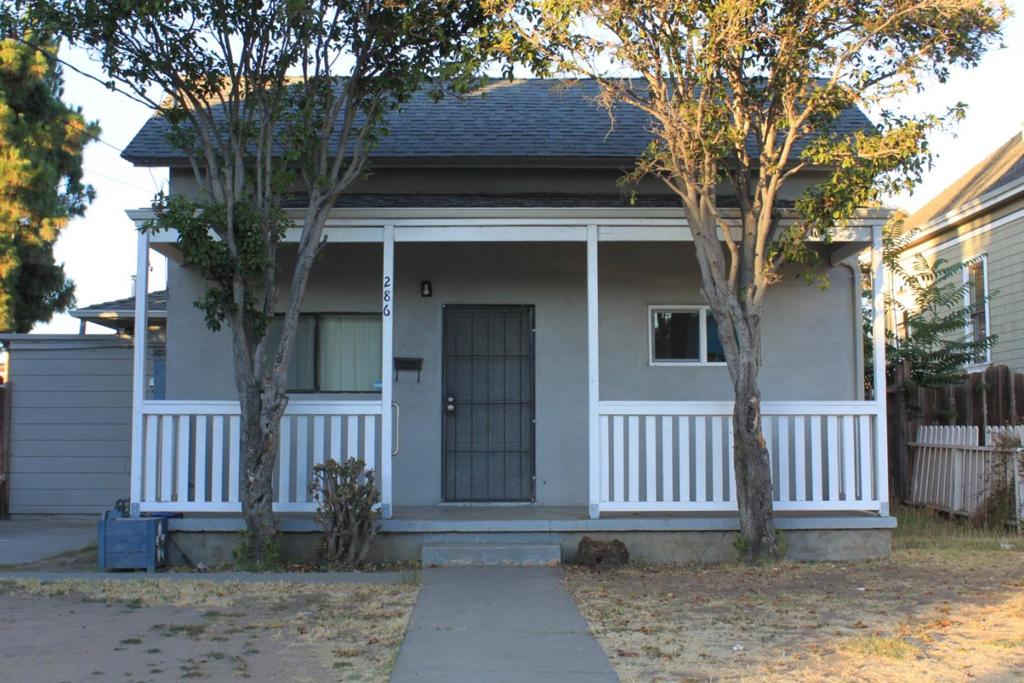 Welcome to 286 N 9th street in San Jose.This charming home sits on a valuable 6,200 SqFt lot in the heart of Silicon Valley. The two bedroom, one bathroom, 771 SqFt residence features an inviting covered front porch and mature shade trees that add character to this classic property being sold strictly AS-IS. The real value is in the LAND. It features a detached garage and large backyard. Minutes from downtown San Jose, Santa Clara University, major tech companies and freeways 87/101/280. Bring your vision and contractor to unlock this property's full potential. Buyer to verify all zoning and development possibilities.