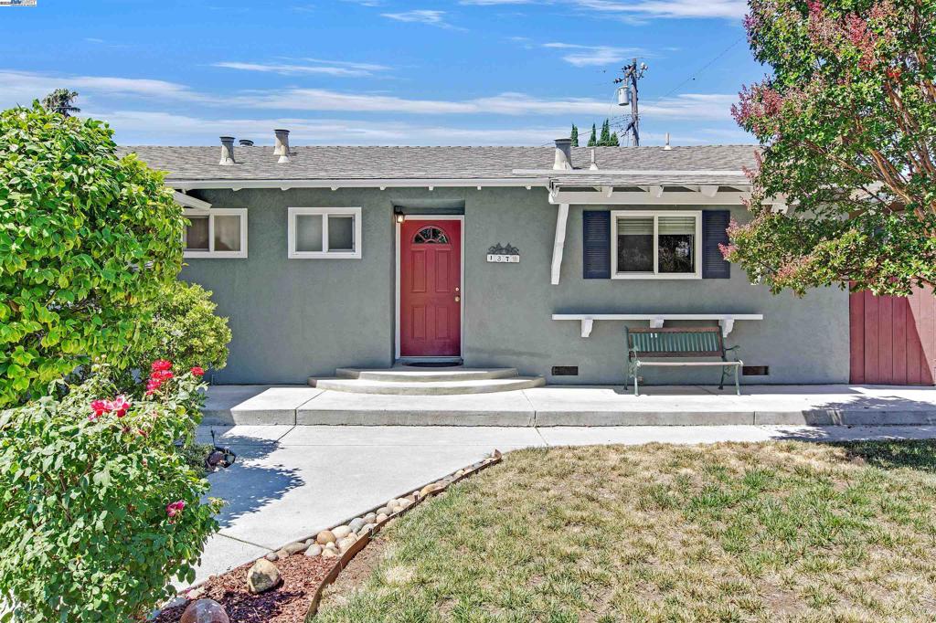 Move right in and enjoy this beautifully maintained single-story home in the heart of Milpitas! This 1462 sq.ft (buyer to verify) 3-bedroom, 2-bath home includes a bonus room with built-in wall units and a charming window seat perfect for a home office, playroom, or media room. You'll love the warm wood flooring, newly carpeted bedrooms, and flexible layout with a spacious dining area or second living space. Enjoy the convenience of inside laundry and an attached 2-car garage. Step outside to a large, private backyard with a patio ideal for entertaining, gardening, or giving your kids and dogs space to play. A beautiful shade tree greets you in the front yard, adding curb appeal and comfort. Located in a quiet, family-friendly neighborhood with high walkability, this home is just minutes from hiking trails, Big Dog Vineyards, Spring Valley Golf Course, and major commuter routes (Hwy 680, 880, and 237). Plus, you’re close to shopping, dining, and great local schools. A rare find in a desirable Milpitas community.