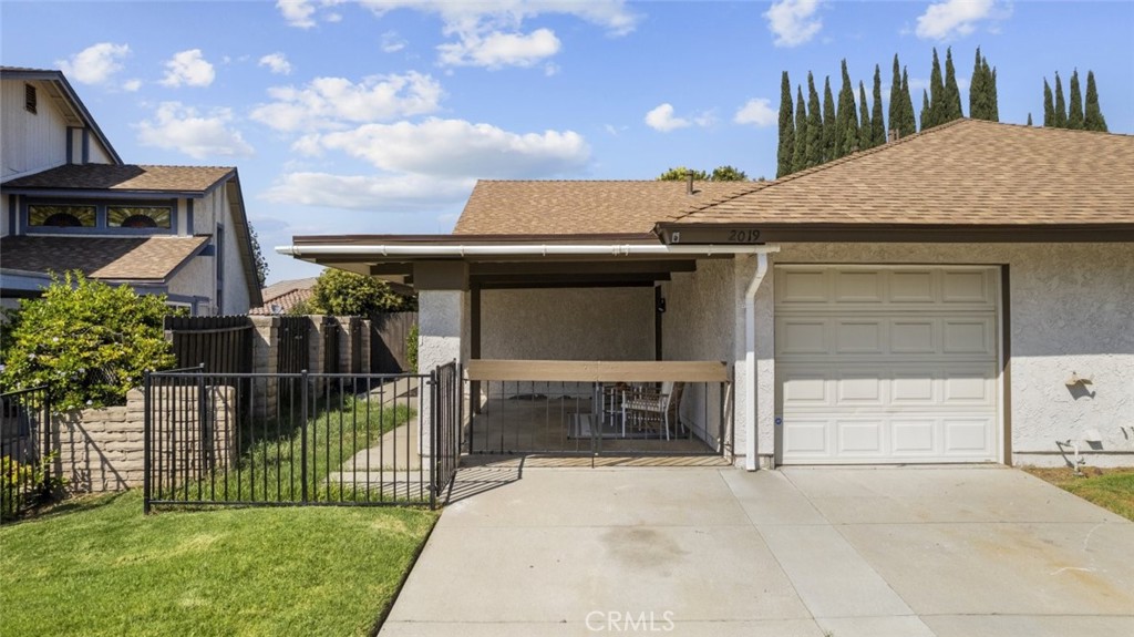 Charming 2 bedroom, 2 bathroom single-family residence in the heart of Simi Valley offering over 900 square feet of comfortable living space. This well-maintained home features spacious bedrooms, full bathrooms, and an open living room perfect for relaxation and entertaining. The full kitchen provides ample cabinetry and functionality, while the attached garage adds convenience. Enjoy laminate flooring, ceiling fans, and covered patios that lead to a generously sized backyard with room to entertain or unwind. A fantastic opportunity to own in a desirable Simi Valley location.