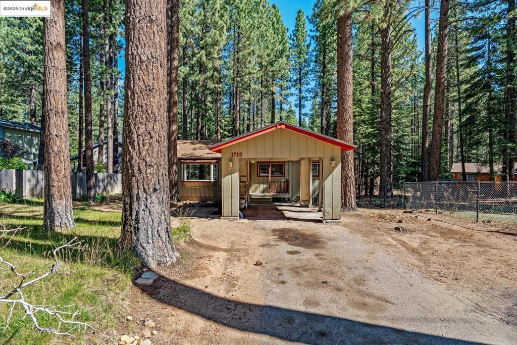 Welcome to this charming single-story cabin nestled in the heart of South Lake Tahoe. This cozy 3-bedroom, 1-bath home offers 1,128 square feet of comfortable living space on an 8,276 sq ft lot. Built in 1969, the property features a wood-burning fireplace, spacious living area, and classic Tahoe character throughout. Located in the peaceful Tahoe Paradise neighborhood, it’s just minutes from hiking trails, ski resorts, and Lake Tahoe’s shoreline. Whether you're seeking a full-time residence or a weekend retreat, this home is a perfect base for mountain adventures.